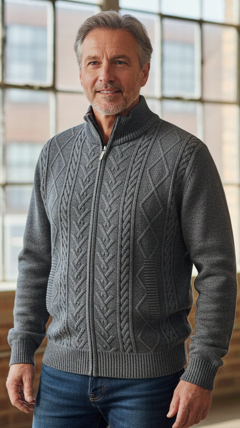 Gray cable knit sweater on a mannequin in a store setting